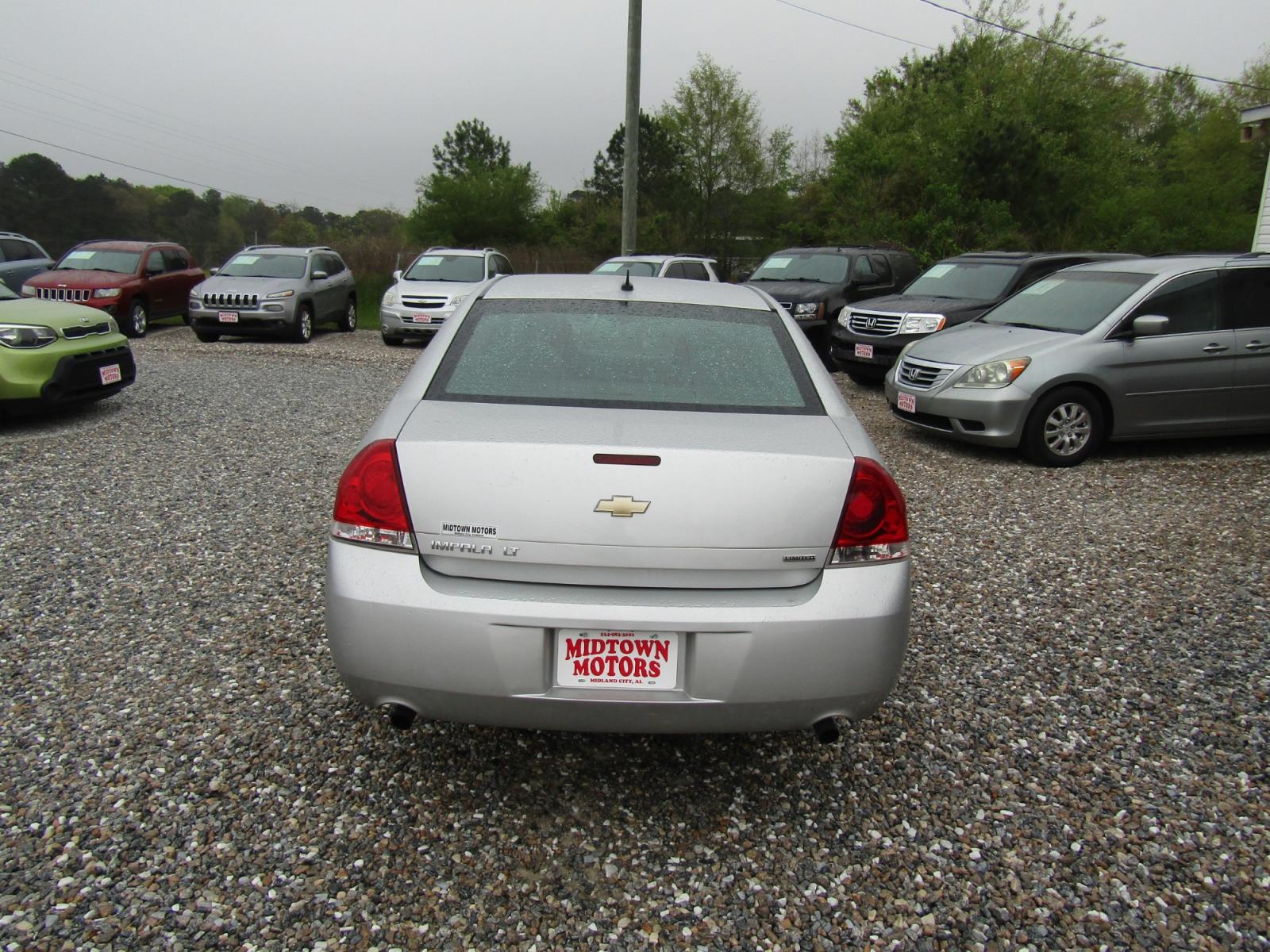 2014 Silver Chevrolet Impala LT (2G1WB5E30E1) with an 3.6L V6 DOHC 16V FFV engine, Automatic transmission, located at 15016 S Hwy 231, Midland City, AL, 36350, (334) 983-3001, 31.306210, -85.495277 - Photo #6